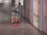 Tin tức - Sinh ra trên xe lăn, em bé TQ bị y tá kéo lê hơn 10m