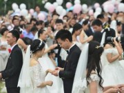 Tin tức - Trường học TQ tổ chức đám cưới cho 86 cựu sinh viên