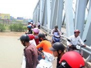 Tin tức - Mẹ ôm con gái 4 tháng tuổi nhảy xuống sông Lam tự tử