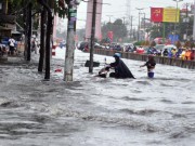 Tin tức - Ảnh: Mưa lớn trong 1 giờ, đường TP.HCM thành sông