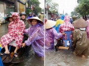 Bà bầu - Ảnh mẹ tươi rói đi đẻ trên đường HN mưa lụt hút nghìn 'like'