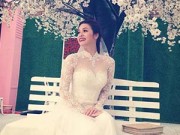 Làng sao - Nhật Kim Anh khoe ảnh mặc váy cưới "trấn an" fans