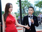 Làng sao - MC Nguyên Khang cầm tay Mai Phương Thúy trong sự kiện