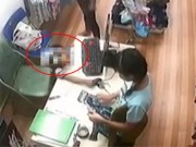 Clip Eva - Video: Người phụ nữ xúi bé trai ăn trộm tiền trong tiệm quần áo