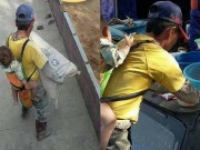 Tin tức - Vợ bỏ đi, cha vừa địu con nhỏ trên lưng vừa bê 10 tấn xi măng để có tiền mua sữa