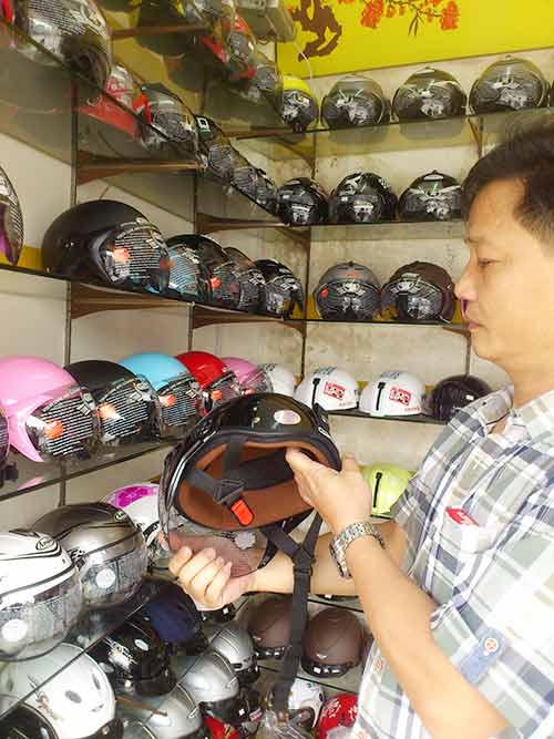 Từ 23/3, mua mũ bảo hiểm được trợ giá - 1