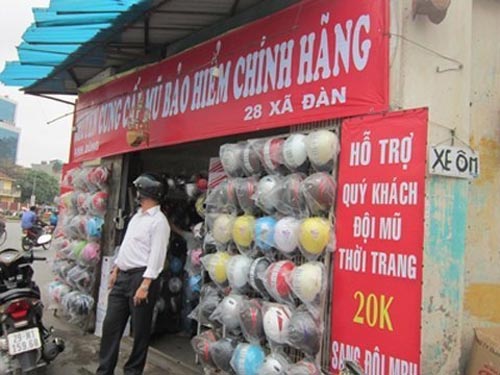 Đổi mũ bảo hiểm: Đẩy giá cao rồi... trợ giá - 1