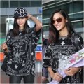 Thời trang - Hoàng Thùy trở về rạng rỡ tại sân bay Tân Sơn Nhất