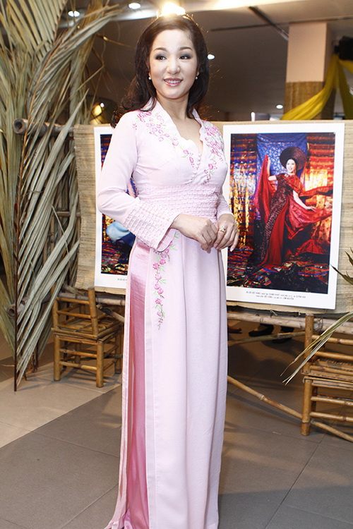 Thúy Nga mặc áo dài, điệu đà gánh hoa - 14