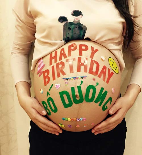 Siêu mẫu Ngọc Thạch khoe bụng bầu mừng sinh nhật chồng - 1