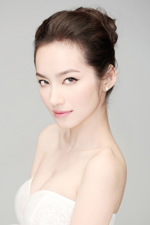 Chào hè với tóc búi đẹp như sao Việt - 13