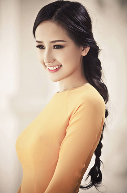 6 kiểu tóc kết hợp áo dài đẹp nhất của sao Việt - 14