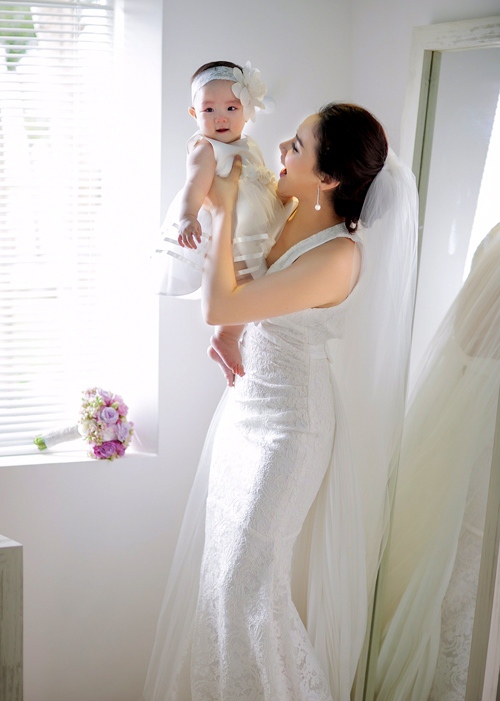 Vợ chồng Trang Nhung khoe ảnh cưới chụp cùng con gái - 11