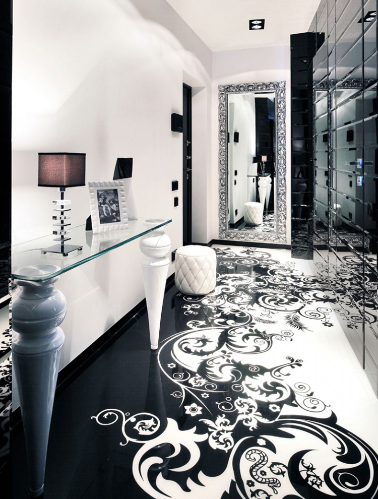  Ngôi nhà của chủ nhân rất sành điệu và tinh tế, với các phòng được trang trí cầu kỳ kiểu cách 2 màu đen trắng. Trong hình là phòng thay đồ kiêu sa.
