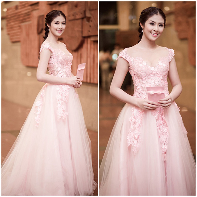 Hoa hậu Ngọc Hân ngọt ngào và nền nữa trong bộ đầm màu hồng pastel lộng lẫy.
