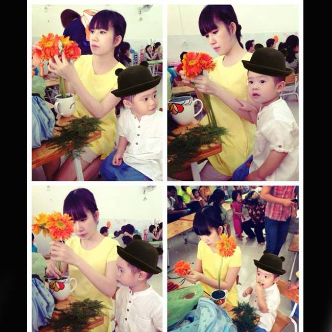 Bà xã Lý Hải thi cắm hoa cùng con trai trong ngày 8/3 tại trường mẫu giáo của Rio.
