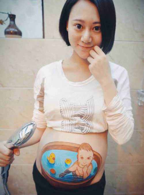 Gặp mẹ ‘nghiện’ vẽ tranh trên bụng bầu - 9