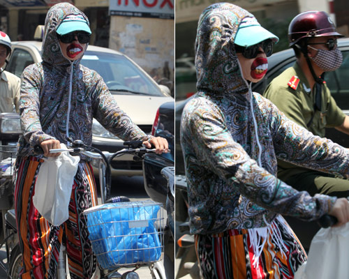 Hà Nội nắng 38°C: Chị em bịt bùng ra phố! - 1