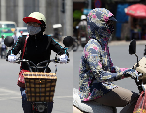 Hà Nội nắng 38°C: Chị em bịt bùng ra phố! - 17
