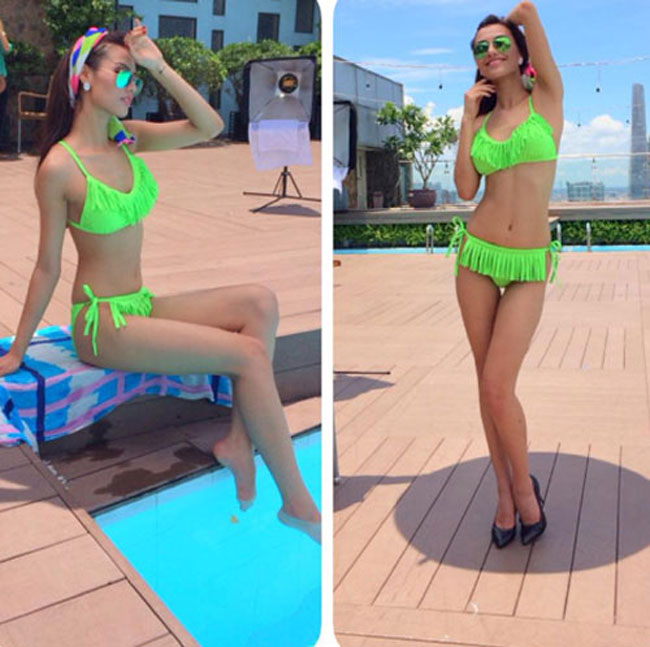 Hồng Quế trở thành tâm điểm tại bể bơi khi xuất hiện với bộ áo tắm màu xanh neon.
