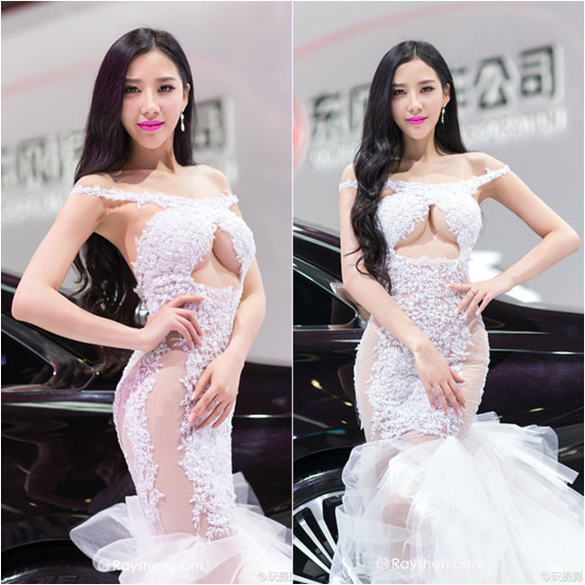 Người mẫu xe hơi nổi tiếng Hàn Phán Phán đã khiến mọi người 'nóng mắt' với thời trang táo bạo của mình tại triển lãm xe hơi.
