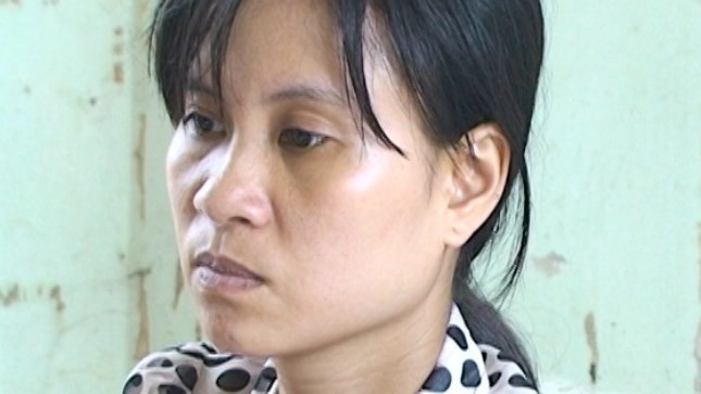 Lời khai người mẹ chém chết con trai 8 tuổi - 1