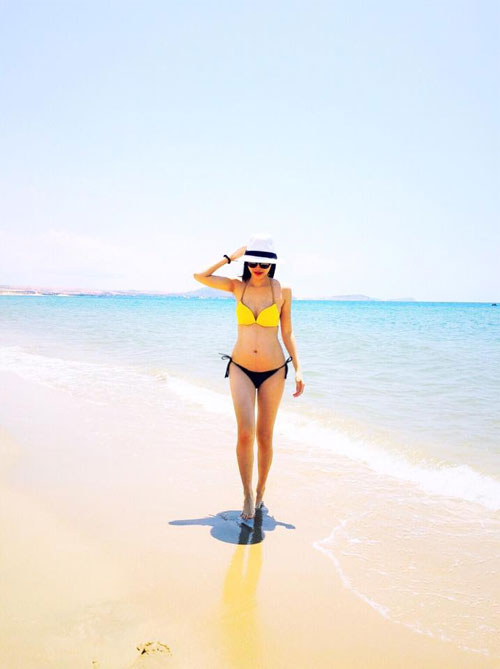 HH Kỳ Duyên đẹp hút hồn trong bộ quân phục - 12