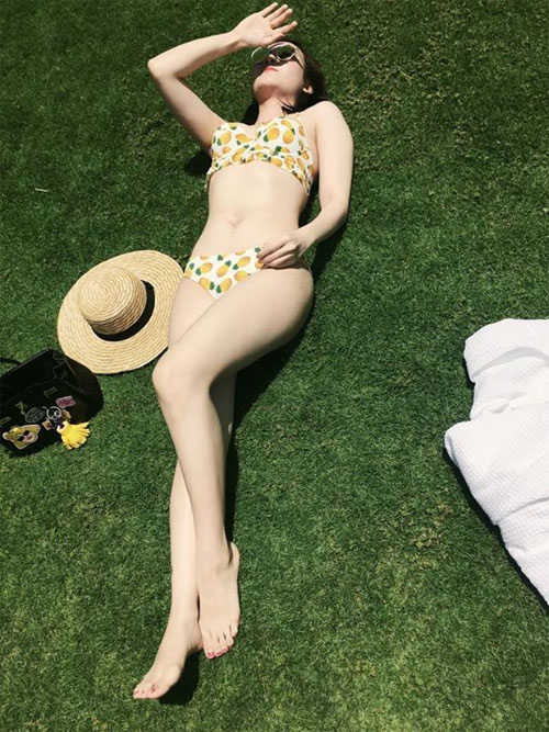 HH Kỳ Duyên đẹp hút hồn trong bộ quân phục - 8