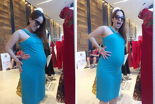 Khánh Thi bầu hơn 8 tháng vẫn #039;chạm tay tới rốn#039; - 1