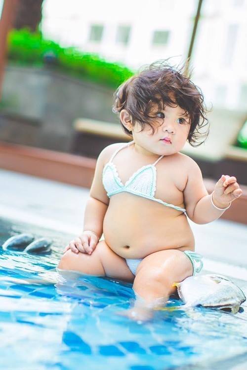 Extremely adorable photo set of a chubby little beauty with a big belly - 3