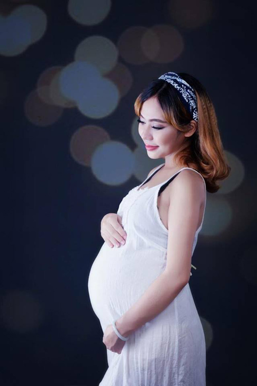 Mẹ bầu 9x từng làm mẫu bikini tự tin khoe bụng thâm, da rạn - 7