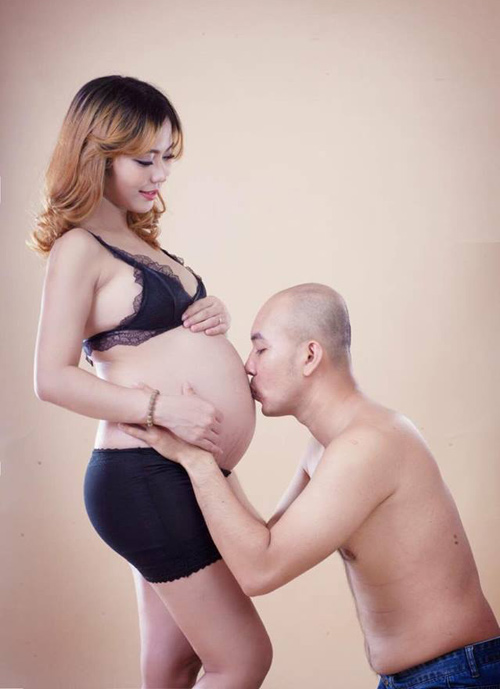 Mẹ bầu 9x từng làm mẫu bikini tự tin khoe bụng thâm, da rạn - 2