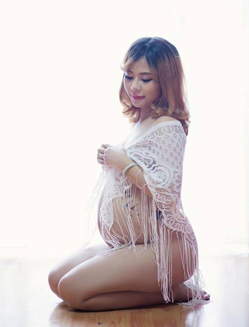 Mẹ bầu 9x từng làm mẫu bikini tự tin khoe bụng thâm, da rạn - 1