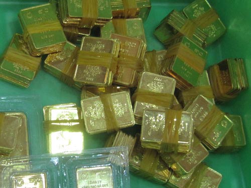 Giá vàng SJC rẻ hơn gần 700.000 đồng/lượng - 1