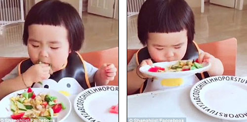 Clip bé gái “thánh ăn” Trung Quốc khiến dân mạng tranh cãi - 1