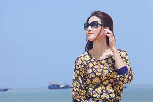 HH Trần Thị Quỳnh trẻ trung trước biển - 6