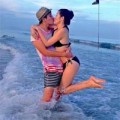 Làng sao - Huy Khánh hôn vợ say đắm giữa bãi biển
