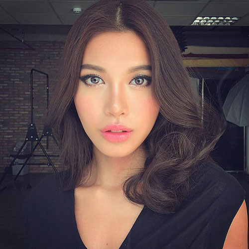 Nhan sắc amp;#34;lột xácamp;#34; khó tin của người mẫu Minh Tú trước nghi án Phẫu thuật thẩm mỹ - 1