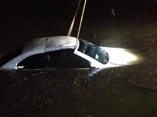 Mải dùng điện thoại, tài xế lao thẳng xe BMW xuống hồ - 6