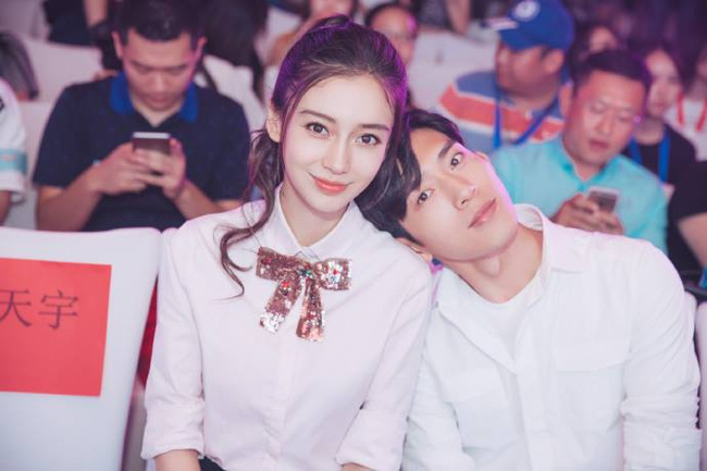 Bỏ rơi Huỳnh Hiểu Minh, Angelababy tình tứ bên trai trẻ - 1