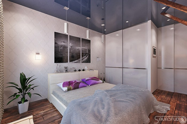 Một phòng ngủ với hệ thống đèn hiện đại...