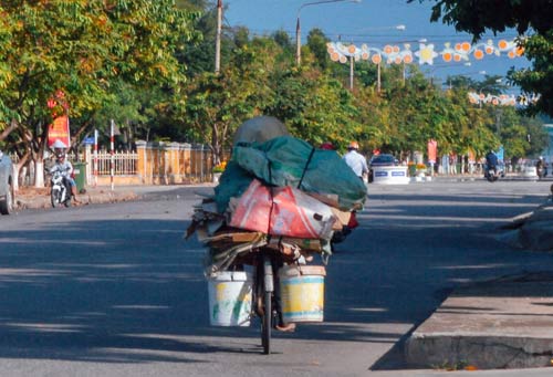 Những người phụ nữ nhọc nhằn đội nắng mưu sinh - 4