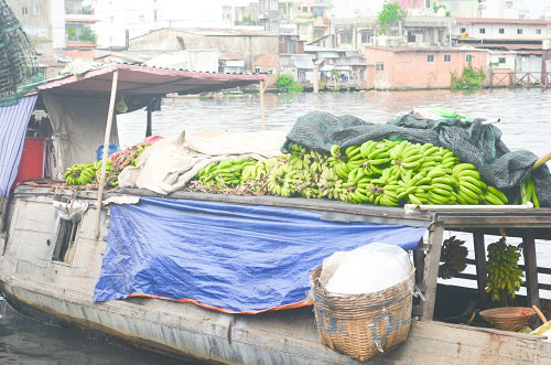 Nơi những phụ nữ lấy quot;thuyền làm nhàquot; giữa lòng Sài Gòn - 7