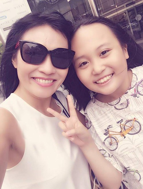 Phương Thanh lần đầu khoe con gái sau 11 năm giấu kín - 1