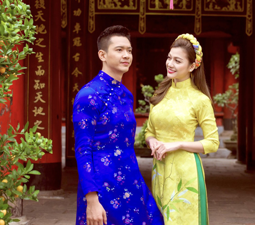 Hồ Đức Vĩnh và hoa hậu Thái Nhiên Phương mặc áo dài đón Tết cổ truyền - 1
