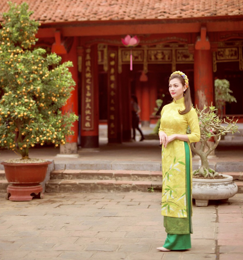 Hồ Đức Vĩnh và hoa hậu Thái Nhiên Phương mặc áo dài đón Tết cổ truyền - 8