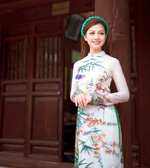 Hồ Đức Vĩnh và hoa hậu Thái Nhiên Phương mặc áo dài đón Tết cổ truyền - 5