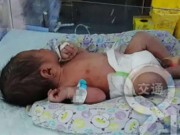 Tin tức - Sản phụ vào gara ôtô sinh con chỉ trong 30 giây rồi bỏ đi mất