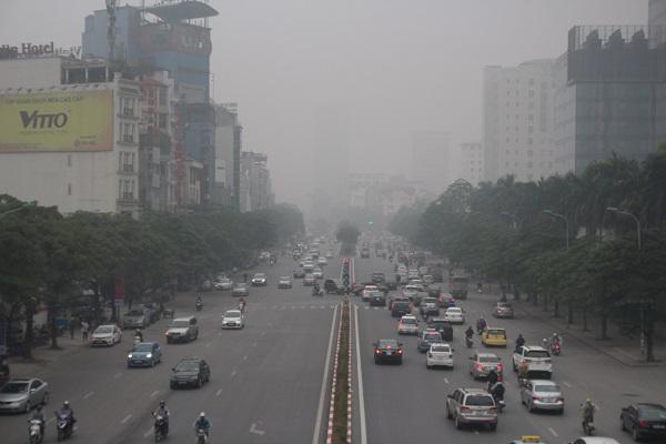 Sương mù bao trùm Hà Nội suốt ngày làm việc đầu tiên của năm 2018 - 7