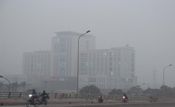 Sương mù bao trùm Hà Nội suốt ngày làm việc đầu tiên của năm 2018 - 2